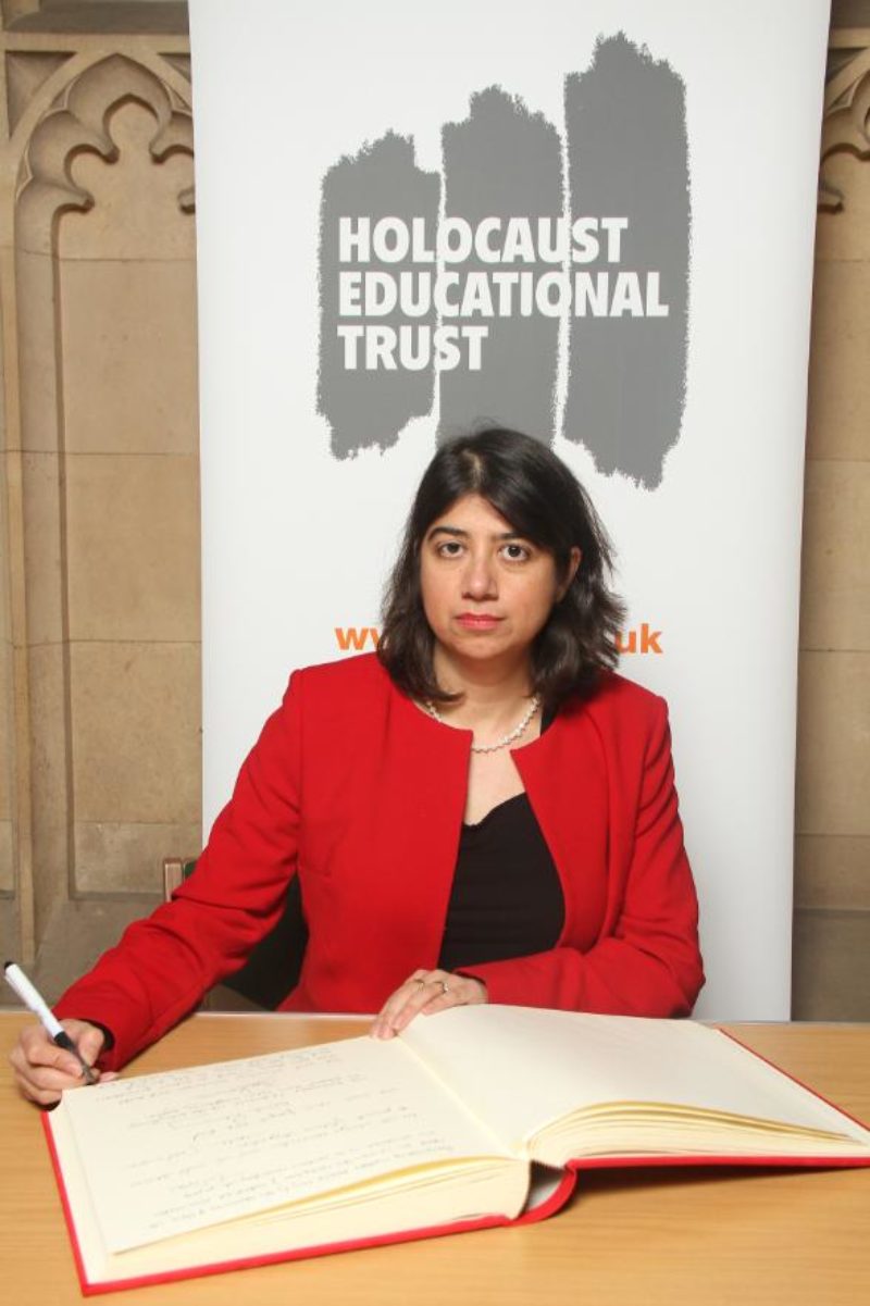 Seema Malhotra MP signing the Holocaust Book of Commemoration
