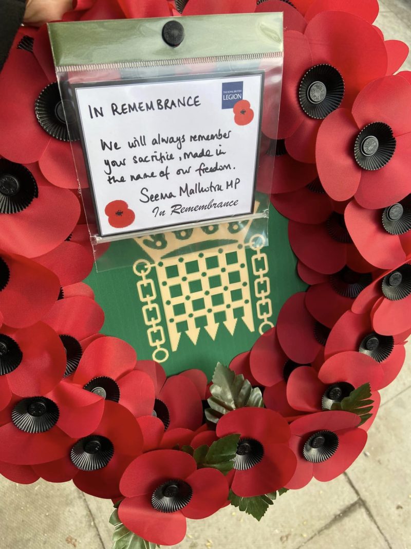 A House of Commons poppy wreath signed by Seema Malhotra