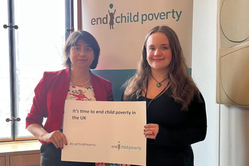 Seema Malhotra MP and End Child Poverty Youth Ambassador hold a sign together saying "It