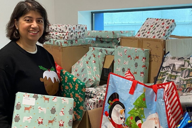 Seema Malhotra with gifts packed for local children