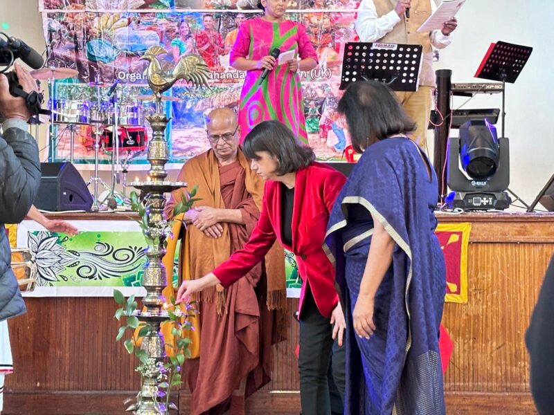 Seema Malhotra MP lights a torch at the Sri Lankan New Year celebration